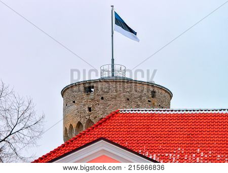Pikk Hermann Tower of Toompea Castle with Estonian flag at the Old town of Tallinn Estonia in winter