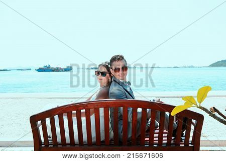 Asian couple photographed before marriage is Pre-wedding on Koh Si Chang Island Popular locations in the Chonburi province at Thailand.