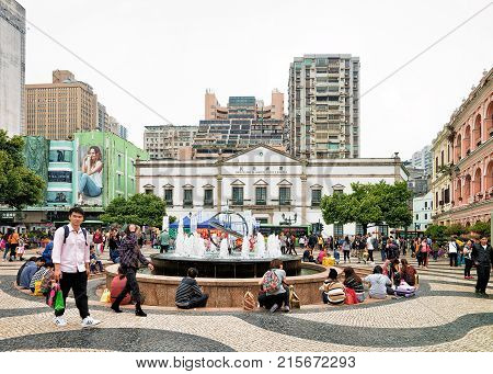 Macao China - March 8 2016: Tourists on Senado Square in Historical old city in Macao China.