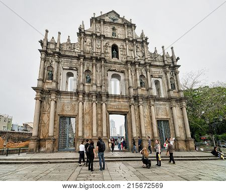 Macao China - March 8 2016: People at Ruins of Saint Paul Church in Historical old city center in Macao China. People on the background