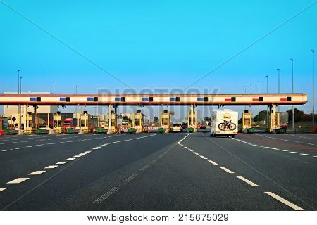 Caravan at toll road transportation express way in Switzerland.