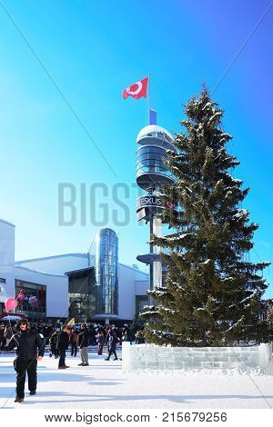 People Celebrating Holiday On Lordi Square In Winter Rovaniemi