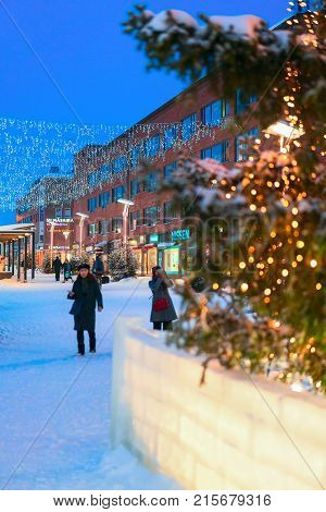 People And Christmas Tree In Lordi Square In Winter Rovaniemi