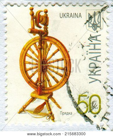 GOMEL, BELARUS, 20 NOVEMBER 2017, Stamp printed in Ukraine shows image of the Spinning wheell, circa 2008. 