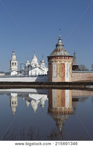 Reflection Prilutsk Saviour Monastery in Vologda river, Russia