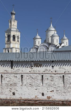 Wall Holy Monastery Prilutsk and Savior Cathedral with bell tower, Vologda, Russia