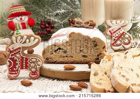 Traditional Christmas Dresden Cake Stollen With Candied Fruits And Almonds. Christmas New Year Decor