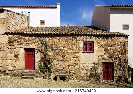 Old traditional houses in the historic village of Idanha a Velha in Portugal; Concept for travel in Portugal