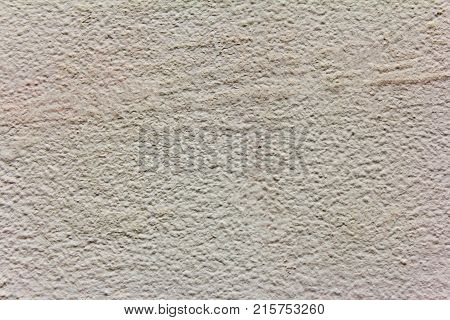 cream or beige background of natural cement or stone old texture