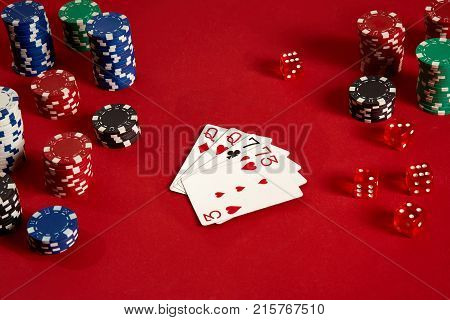 Poker cards and gambling chips on red background. Top view. Copy space. Still life. Flat lay. 2 Pair