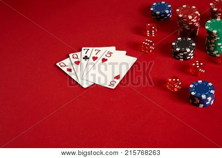 Poker cards and gambling chips on red background. Top view. Copy space. Still life. Flat lay. 2 Pair