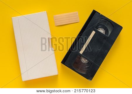 Blank used video casette tape retro technology. Video home system (VHS) recording tape with blank warapper as copy space.