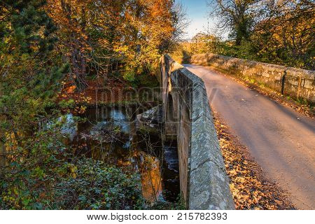 Mitford Bridge over River Wansbeck, the river rising