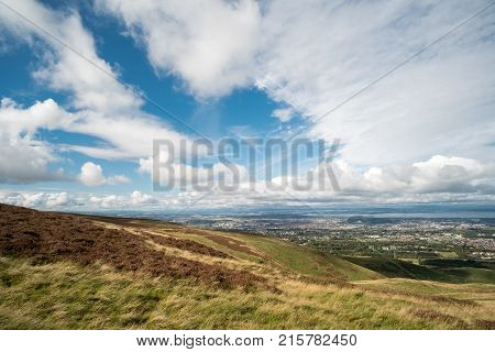 Scenic View Of The City Of Edinburgh With Hills