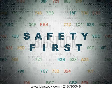 Security concept: Painted blue text Safety First on Digital Data Paper background with Hexadecimal Code