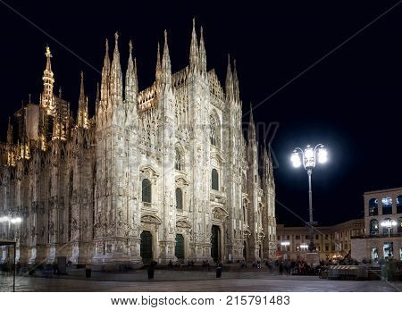 The famous Milan Cathedral (Duomo di Milano) on the Piazza del Duomo in Milan, Italy. Milan Duomo is the largest church in Italy and the fifth largest in the world.