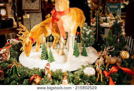 STRASBOURG FRANCE - NOV 21 2017: Reindeer toys and Christmas decoration on display in Villeroy & Boch store windows