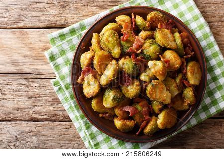 Fried In Breaded Brussels Sprouts With Bacon Close-up. Horizontal Top View, Rustic