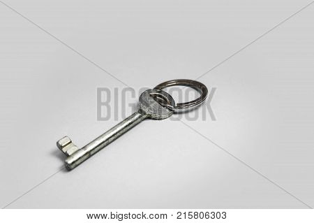 Old key isolated on white background. without shadow