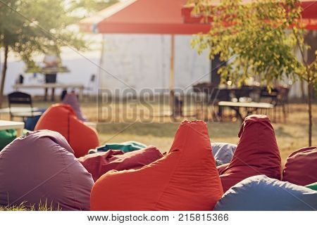 Closeup of bean bag chairs at city park outdoors