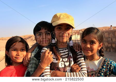 Khichan, India - February 12: Unidentified Kids Play Near Water Reservoir On February 12, 2011 In Kh