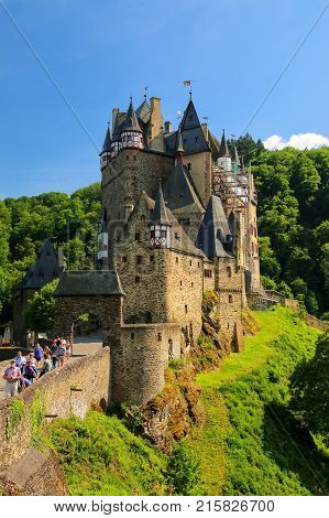 Eltz, Germany - May 25: Unidentified People Walk To The Eltz Castle On May 25, 2017 In Rhineland-pal