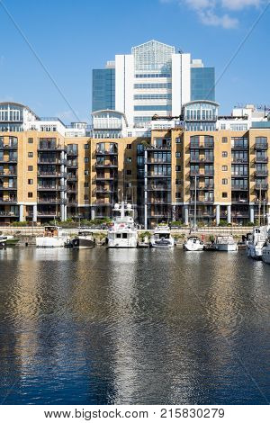 LONDON, UK - OCTOBER 1, 2015: View of the boats and barges in St Katherines Dock in London, England