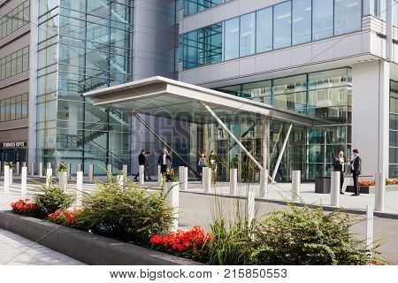MOSCOW, RUSSIA - SEP 20, 2017: People outdoors at entrance of Ducat Place III - one of the most famous and high-quality office centres in Moscow.