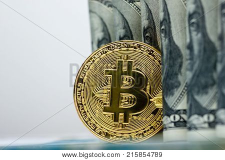 Bitcoin golden coin New virtual money and dollar background . Cryptocurrency. Business and Trading concept.