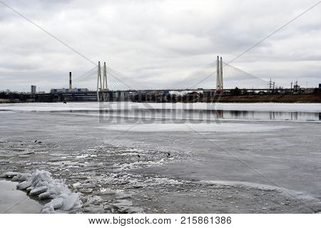 Cable stayed bridge on the outskirts of St. Petersburg at winter day Russia.