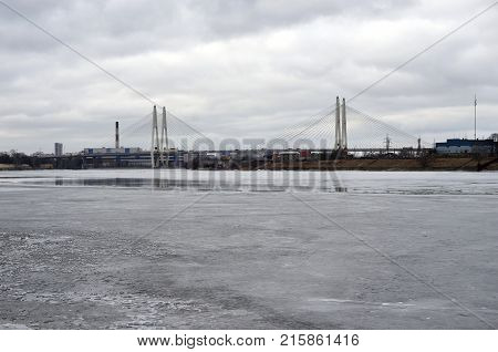 Cable stayed bridge on the outskirts of St. Petersburg at winter day Russia.