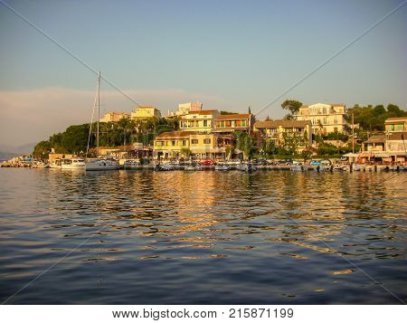 Kassiopi Corfu Greece - June 07 2013 : Beautiful sunset of boat docking area in Kassiopi Corfu Greece
