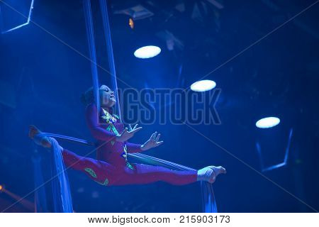 Belarus Gomel June 13 2017 Palace of Culture performance of the Abel Folk CircusA girl dancing a dance on canvases.Children's sports. Girl gymnast. Straight tricks