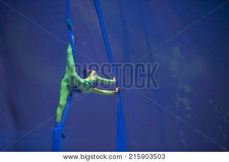 Belarus Gomel June 13 2017 Palace of Culture performance of the Abel Folk CircusA girl dancing a dance on canvases.Children's sports. Girl gymnast. Straight tricks