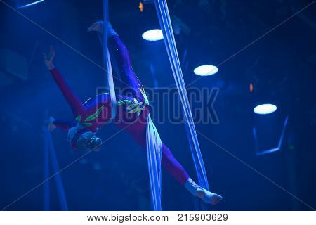 Belarus Gomel June 13 2017 Palace of Culture performance of the Abel Folk CircusA girl dancing a dance on canvases.Children's sports. Girl gymnast. Straight tricks