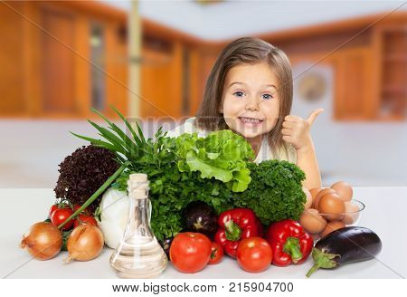 Girl little vegetables healthy eating elementary age child care preadolescent child