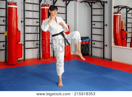 Female karate instructor in dojo