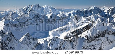 Beautiful snowy peaks in winter. View from peak Lomnicky stit in High Tatras mountains Slovakia