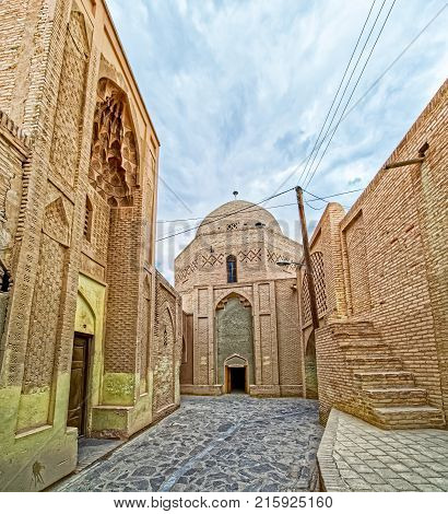 Narrow street in the old part of the Nain city, Iran.
