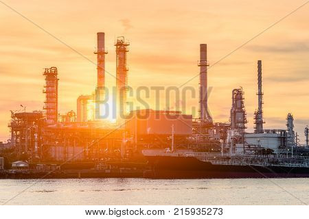 Oil Refinery industry plant at sunrie dawn sky background.