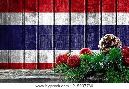 Wooden Christmas background with a flag of Costa Rica. There is a place for your text in the photo.