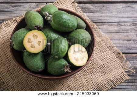 Tropical fruit feijoa . Healthy vegetarian food background