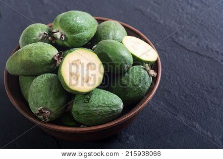 Tropical fruit feijoa . Healthy vegetarian food background