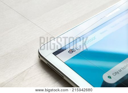 JYVASKYLA FINLAND - JULY 1 2017: Tripadvisor website and home page on tablet screen. Tripadvisor is a travel site for customer reviews and ratings.