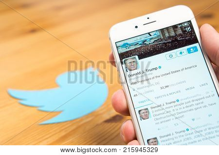 JYVASKYLA FINLAND - JUNE 13 2017: The official Twitter account of Donald Trump on mobile and printed logo. The American President has over 32 million followers on Twitter. Illustrative editorial.