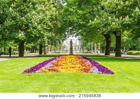 WARSAW POLAND - MAY 23 2017: Saxon Garden in Polish Ogród Saski is a famous park in Warsaw. Beautiful flowers in famous and popular attraction in the capital city of Poland. Editorial.