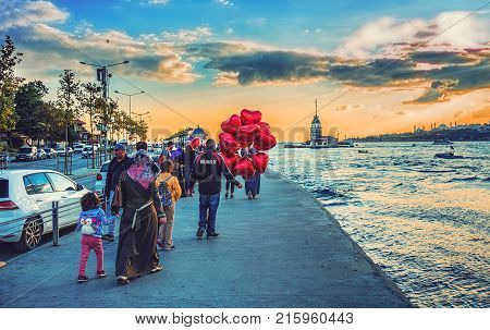 Istanbul Turkey: People are going to meet sunset with view of Maiden's tower in Uskudar on October 3 2017