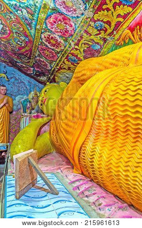 KETAWALA SRI LANKA - DECEMBER 1 2016: The giant statue of Reclining Buddha in ancient Bogoda Temple on December 1 in Ketawala.