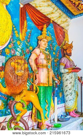 KETAWALA SRI LANKA - DECEMBER 1 2016: The colored statues of roaring lion and ancient Kings in Bogoda Temple on December 1 in Ketawala.