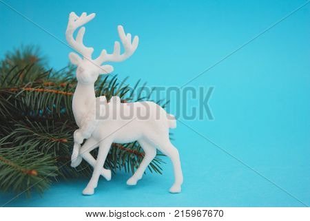 White Decorative Cristmas Reinder with Fir tree